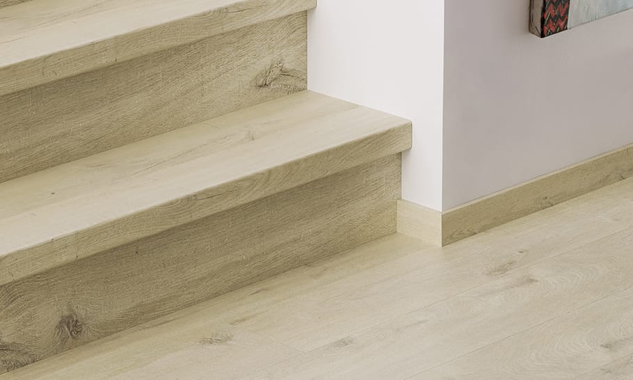 close up of stairs with beige vinyl stair covers